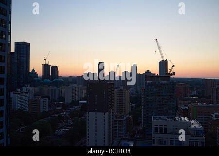 Amazing landscape of the skyline of Toronto in Canada with its high rise sktscrapers and office buildings during sunset Stock Photo