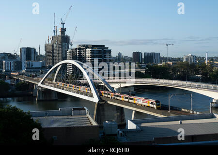 A Queensland Rail train crossing the Merivale Bridge, Brisbane, Queensland, Australia Stock Photo