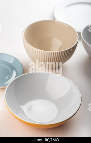 Different bowls on white background. Stock Photo