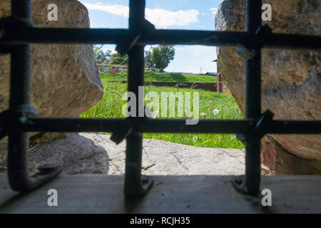 Grate on a prison cell window in the Spaso-Preobrazhensky Solovetsky Monastery. Russia, Arkhangelsk region, Primorsky district, Solovki Stock Photo