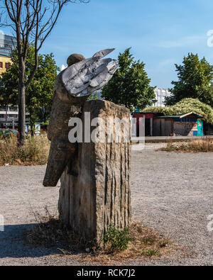 Berlin-Mitte, Kulturforum, St. Matthew's Church square. Sandstone & cast aluminium sculpture, “Guardian Angel Liberty” by sculptor Peter H. Wiener Stock Photo
