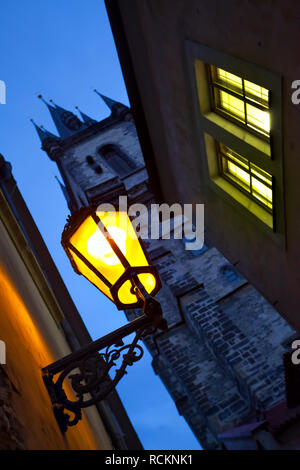 Street with old lantern in Prague at night, Czech republic. Focus on the street light. Shallow DOF! Stock Photo