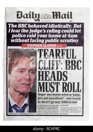 The front page of the Daily Mail with the headline Tearful Cliff: Heads Must Roll, discussing the search of his house and child abuse claims. Stock Photo