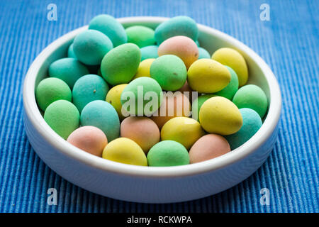 Colorful candy eggs filled with rich chocolate. Stock Photo