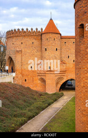 Warsaw, Mazovia / Poland - 2018/12/15: The Barbican - semicircular fortified XVI century outpost with the defense walls and fortifications of the hist Stock Photo