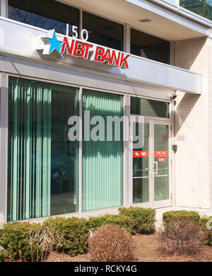 BURLINGTON, USA - APRIL 3, 2016 :  NBT bank, street view. NBT Bancorp Inc. is a financial services holding company headquartered in Norwich, N.Y. Stock Photo