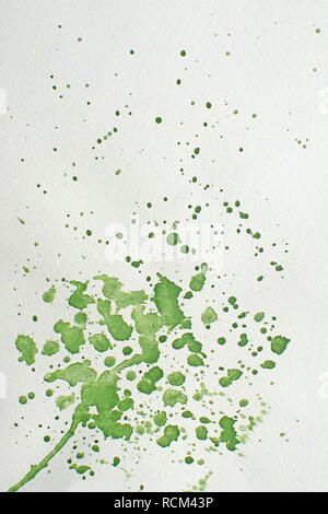 Green wet splatter watercolor background texture fresh flow drops and strokes on paper. Stock Photo