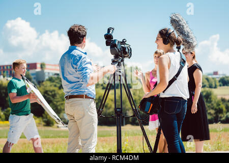 Model in the make-up during video shoot on production set Stock Photo