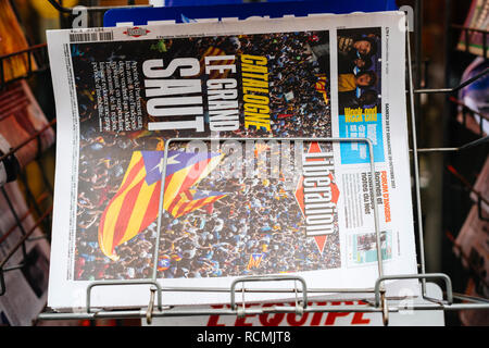 PARIS, FRANCE - OCT 28, 2017: Details of Liberation French newspaper with news from Spain about the Catalonia Referendum and protests in Barcelona - kiosk stand in city  Stock Photo