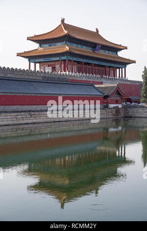 Forbidden City gate building in Beijing reflected in moat Stock Photo