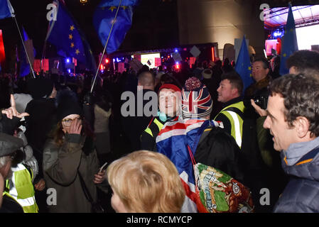 Parliament Square, London, UK.  15th January 2019. A small group of 'yellow vests' briefly walk through the square. Decision day live by the People's Vote rally in Parliament Square. People gather to watch the debate in Parliament and the final vote on the Brexit deal. Credit: Matthew Chattle/Alamy Live News Stock Photo