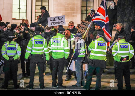 Westminster, London, UK, 15th Jan 2019. Brexit supporting protesters have been surrounded by Police near Parliament Square. Pro and Anti Brexit protesters rally in Parliament Square and at the Houses of Parliament in Westminster ahead of and during the vote on Theresa May's Brexit deal. Credit: Imageplotter News and Sports/Alamy Live News Stock Photo