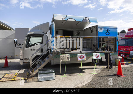 Tokyo, Japan. 16th Jan, 2019. An earthquake simulator vehicle on display during the Disaster Preparedness Drill for Foreign Residents in FY2018 at Komazawa Olympic Park General Sports Ground. About 263 participants (including Tokyo foreign residents and members of embassies and international organizations) were instructed how to protect themselves in case of earthquake disaster by the Tokyo Fire Department with the assistance of volunteer interpreters in English, Chinese, Spanish and French. Participants learned how to give chest compression, shelter's rules life and experienced the shakin Stock Photo