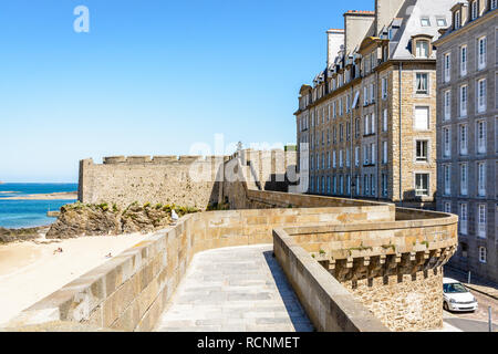 View over the rampart walk of the old town of Saint-Malo in Brittany, France, on a sunny day with the bastion of Holland in the background. Stock Photo