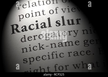 Fake Dictionary, Dictionary definition of the word racial slur. including key descriptive words. Stock Photo