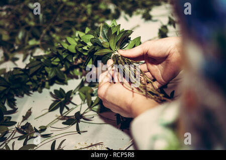 green leaves in a basket in the basket on the table the wedding tradition of Ukraine 2019 Stock Photo