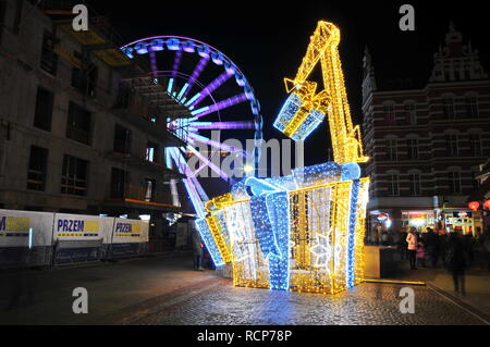 Christmas decorations in city center with Ferris wheel in the back. GDANSK, POLAND, December 2, 2017. Stock Photo