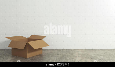 Empty open cardboard box on the floor with a wall background. Concept of moving and shipping Stock Photo