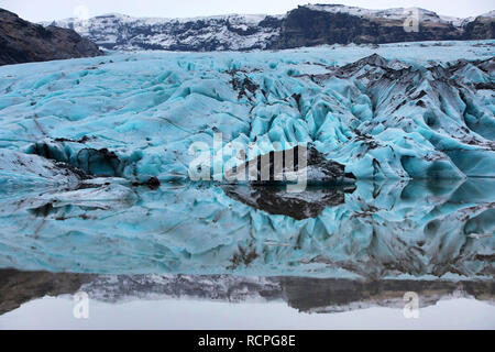 Blue ice of the Solheimajokull Glacier, part of the Myrdalsjokull Icecap on the south coast of Iceland Stock Photo
