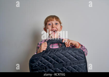girl with briefcase on white background Stock Photo