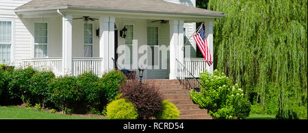 Row of Homes Flying the American Flag Stock Photo