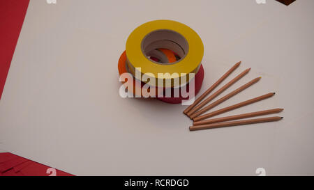 Tape and Colored Pencils on Table Stock Photo