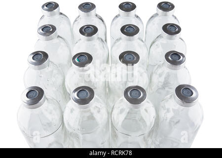 Used medical phials with metal caps. Isolated on white background. Stock Photo