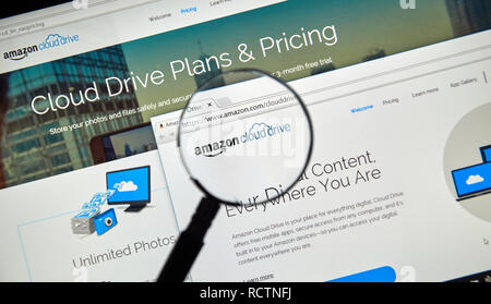 MONTREAL, CANADA - MAY 8, 2016 : Amazon Cloud Drive web page under magnifying glass. Amazon Cloud Drive is a web storage application from Amazon. Stock Photo