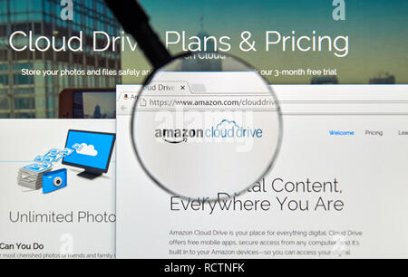 MONTREAL, CANADA - MAY 8, 2016 : Amazon Cloud Drive web page under magnifying glass. Amazon Cloud Drive is a web storage application from Amazon. Stock Photo