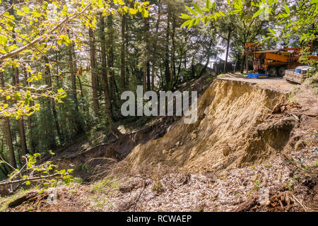 Collapsed paved road due to a landslide as result of heavy rains, San Francisco bay area, California Stock Photo