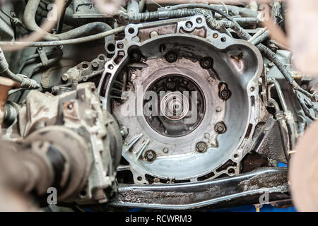 Close-up broken automatic transmission on an old car prepared for repair in a car repair shop Stock Photo