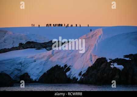 The landscape of the coast of Antarctica, Mountains covered with snow and ice-cold ocean. Stock Photo