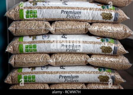 Wood pellets for heating packaged in sacks, at the WestPellets company in Titz, North Rhine-Westphalia Stock Photo