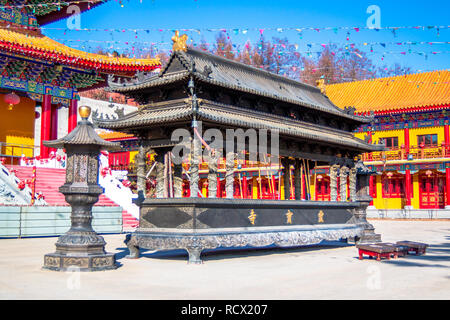 Censer of Lingbao temple in Hunchun city of northern province Jilin of China. Popular place of tourists from the border regions of Russia and Korea. Stock Photo