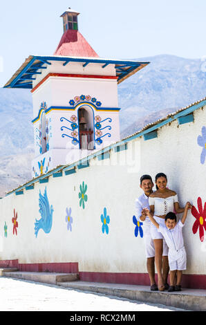 Happy family on the edge of the church of Antioquia located in the city with the same name north of Lima Stock Photo