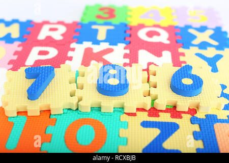 Picture of numbers on the colored alphabets letters. Stock Photo