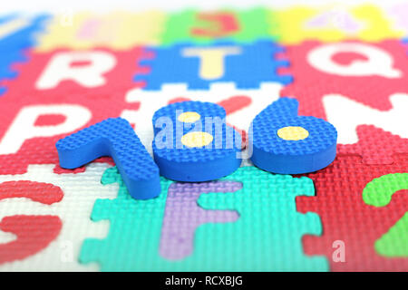 Picture of numbers on the colored alphabets letters. Stock Photo