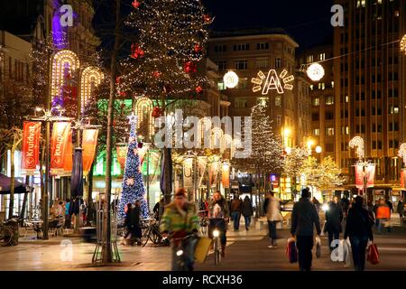 Shopping street in evening, pedestrian area, Meir, city centre of Antwerp, Flanders, Belgium, Europe Stock Photo