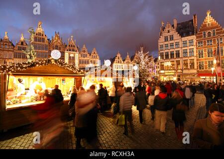 Christmas market at the town hall on Grote Markt, surrounded by old guild houses, historic centre of Antwerp, Flanders, Belgium Stock Photo
