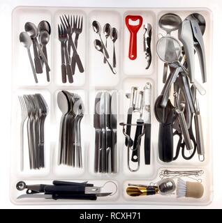 Rack drawer for cutlery, various kitchen tools Stock Photo