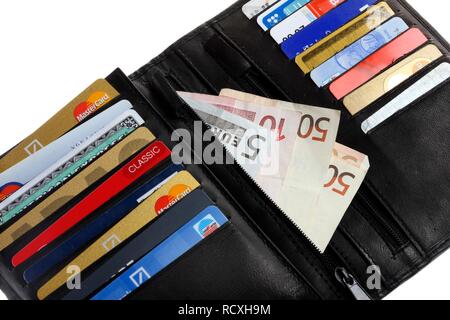 Wallet with various credit cards, bank cards, store cards, euro notes Stock Photo