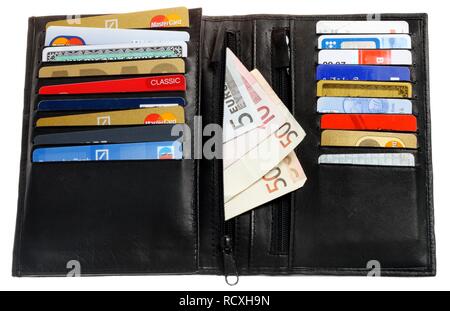 Wallet with various credit cards, bank cards, store cards, euro notes Stock Photo