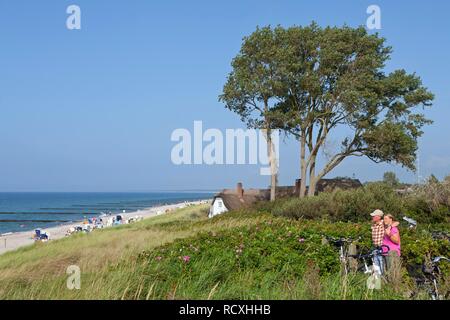 Couple overlooking the beach, Ahrenshoop, Darss, Mecklenburg-West Pomerania, PublicGround Stock Photo