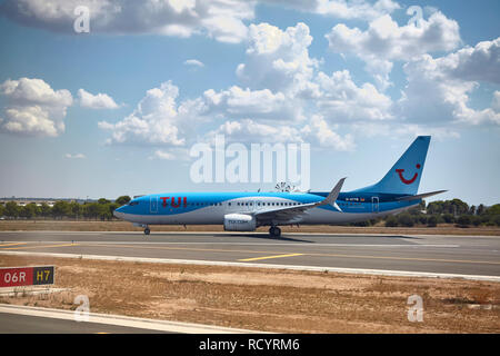 Palma de Mallorca, Spain - August 21, 2018: TUI operator Boeing 737 800 taxis on the tarmac. Stock Photo