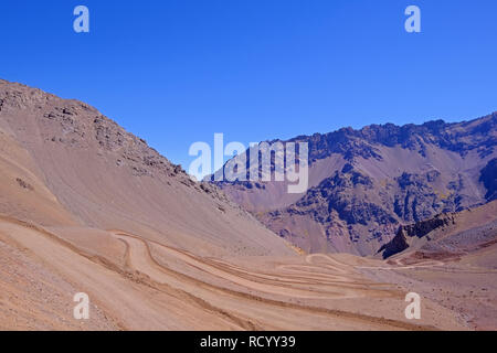 Old dangerous mountain road of the Paso de la Cumbre or Cristo Redentor in the Andes between Argentina and Chile Stock Photo