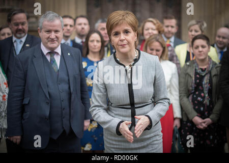 SNP Westminster leader Ian Blackford with Scotland's First Minister Nicola Sturgeon and SNP MPs in Westminster Hall at the Houses of Parliament in London, ahead of a motion of no confidence in the Government being debated. Stock Photo