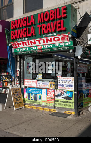 The exterior of Bangla Mobile Bangla Travel, a multi purpose store on 37th Road in Jackson Heights, Queens, New York City. Stock Photo