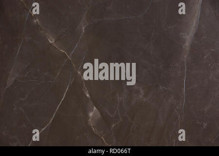 Natural stone marble brown with streaks, is called Bronze Amani. Stock Photo