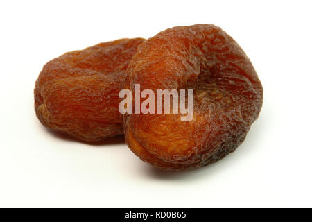 Stack of Sundried Apricots (Isolated on white background) Stock Photo