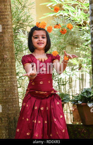Premium Photo  South indian girl kids wearing beautiful traditional dress  long skirt and blouse